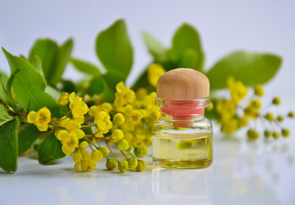 cosmetic oil, essential oil, cosmetology, oil, spa, alternative, wellness, therapy, relaxation, flower wallpaper, flowers, beauty, the medicine, flower background, massage, beautiful flowers, scent, the science, nature, petals, barberry, yellow flowers, glass bottle